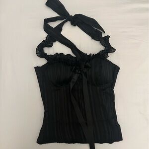 Black halter neck top with bow and shimmer detail